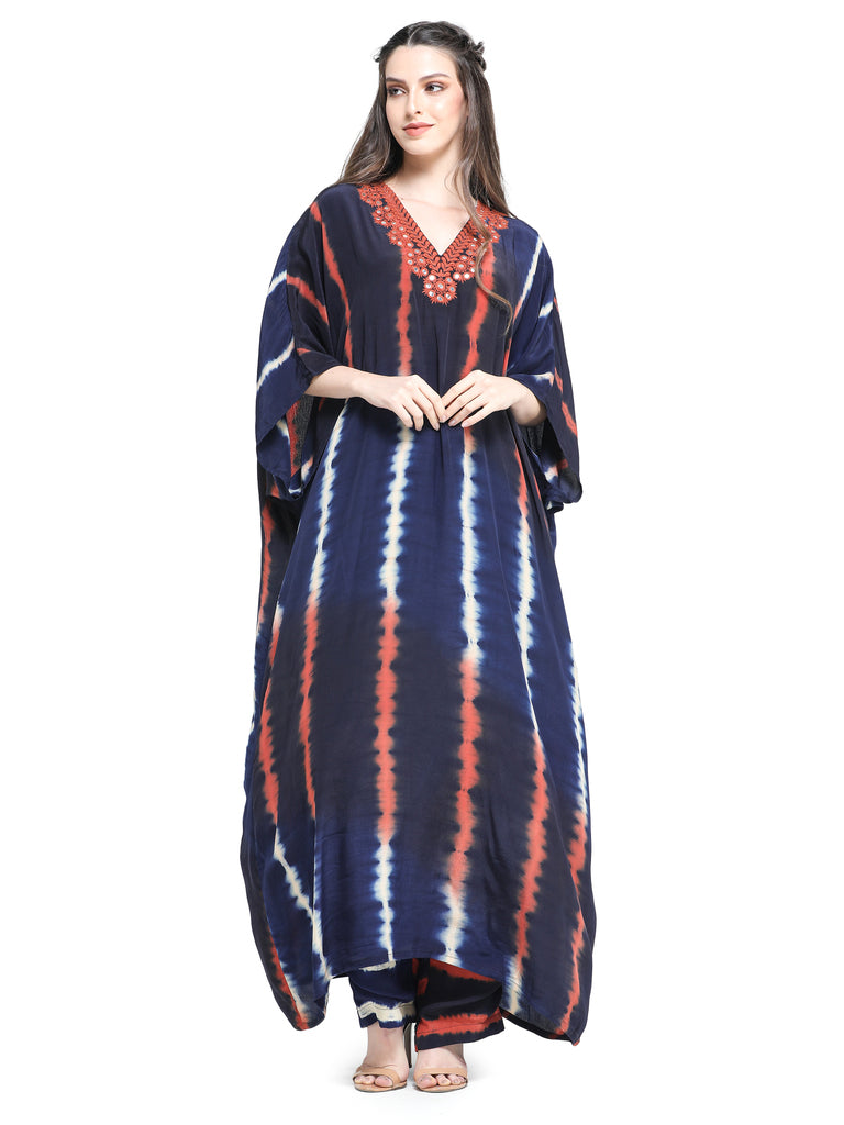 Blue leheriya dyed kaftan kurta with mirror work paired with pants