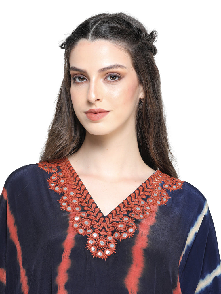 Blue leheriya dyed kaftan kurta with mirror work paired with pants
