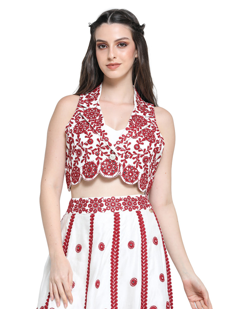 White with red mirror embroidered skirt with embroidered crop jacket and white bustier