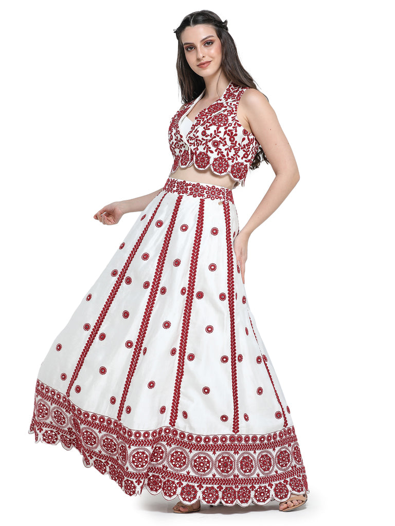 White with red mirror embroidered skirt with embroidered crop jacket and white bustier