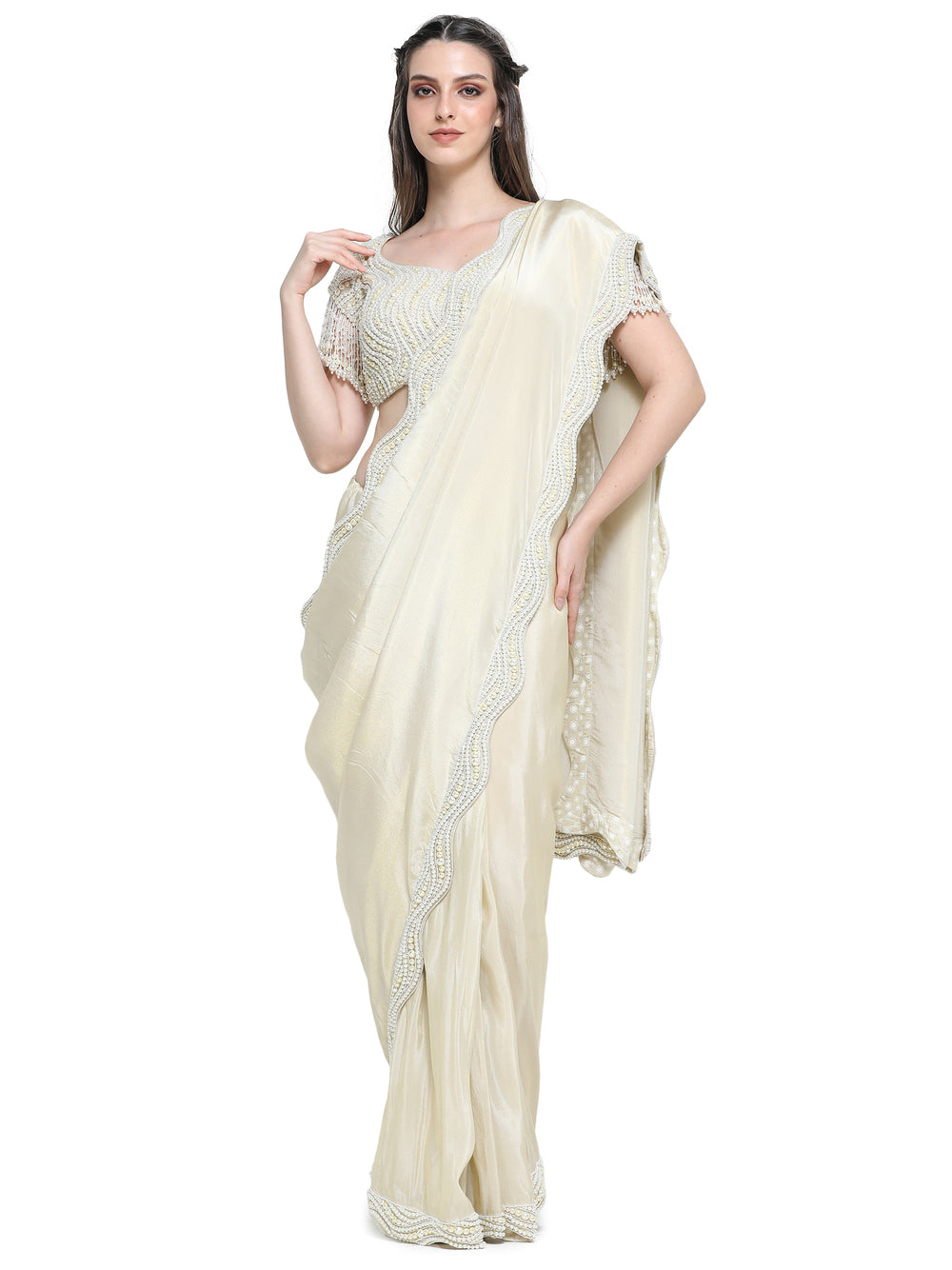 Off white tissue organza sari with pearl work border and embroidered blouse