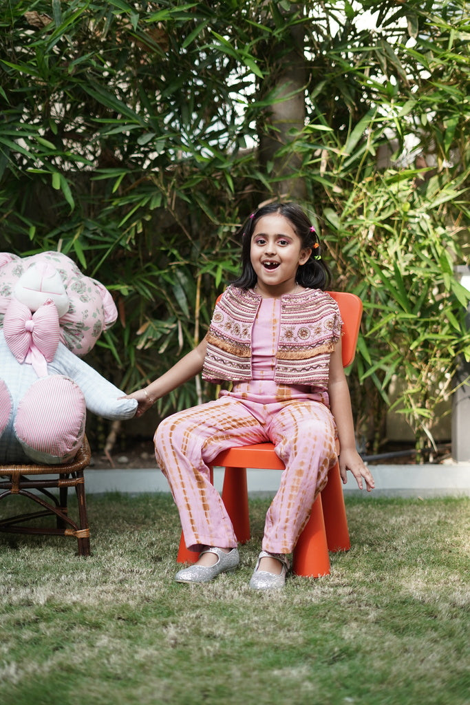 Pink and brown shibori jumpsuit with embroidered cape
