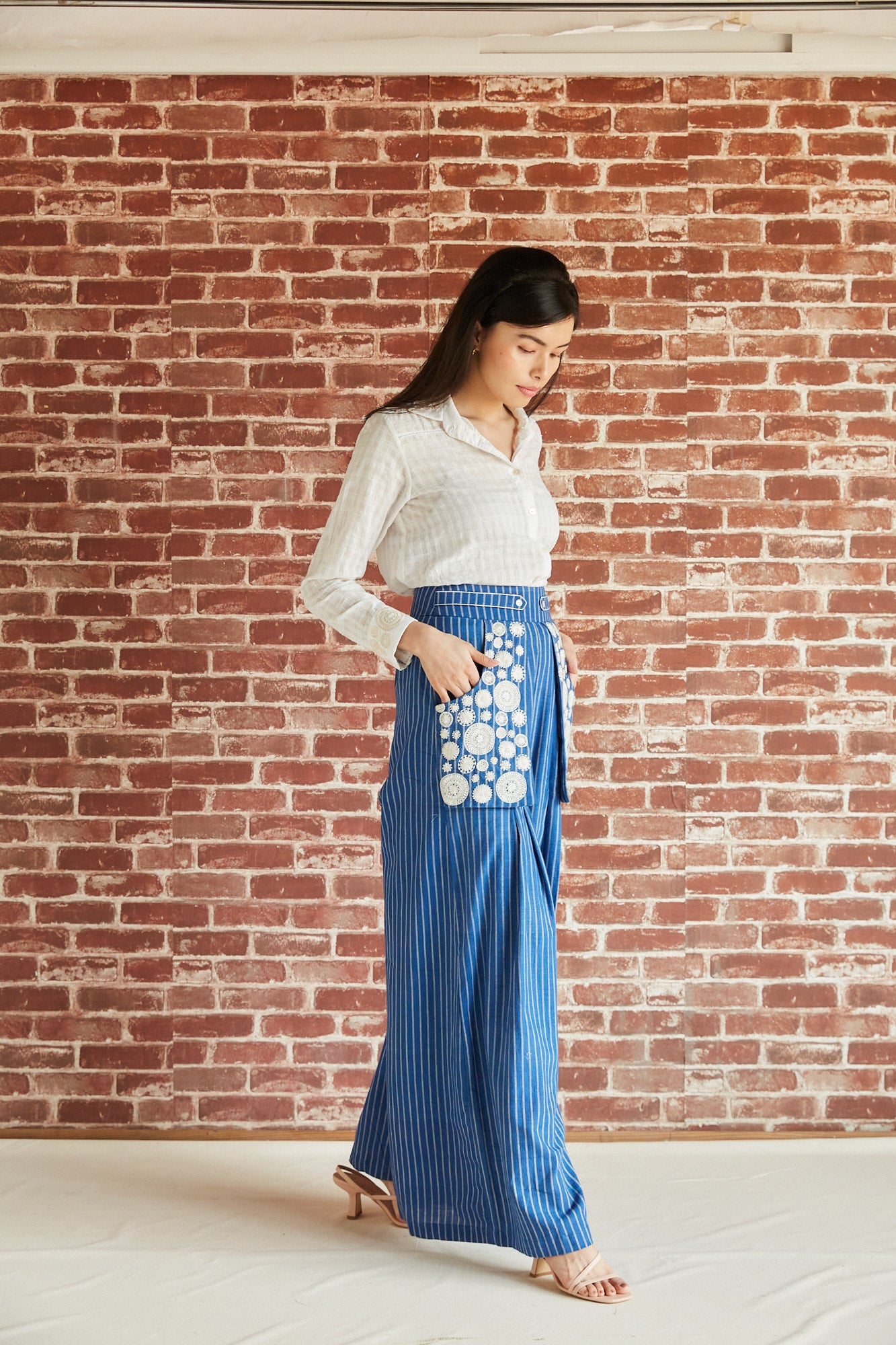 Blue cotton stripe palazzo pants with embroidered pockets