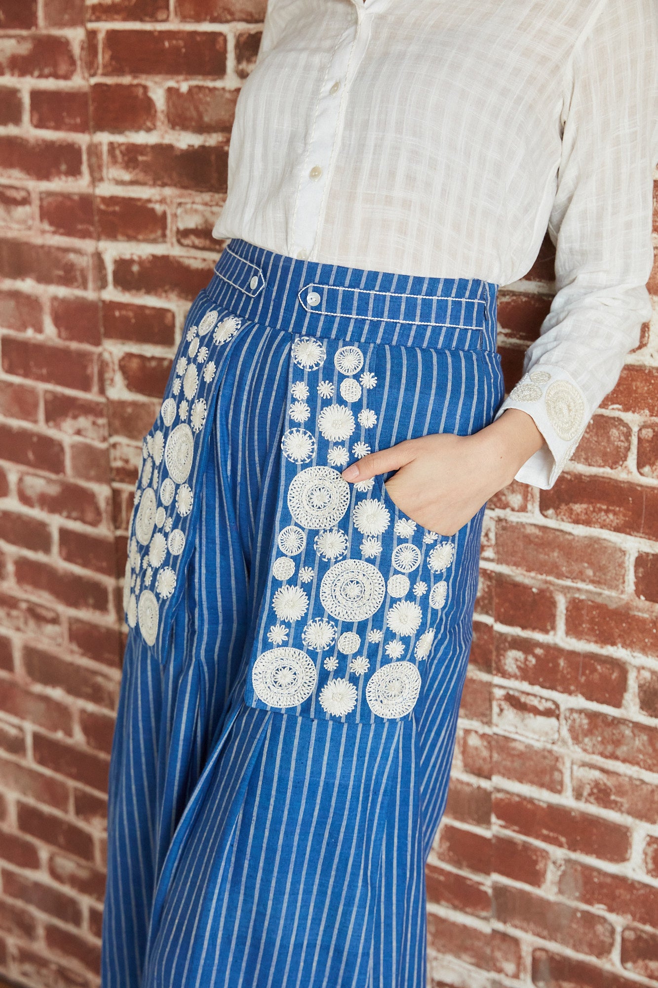 Blue cotton stripe palazzo pants with embroidered pockets