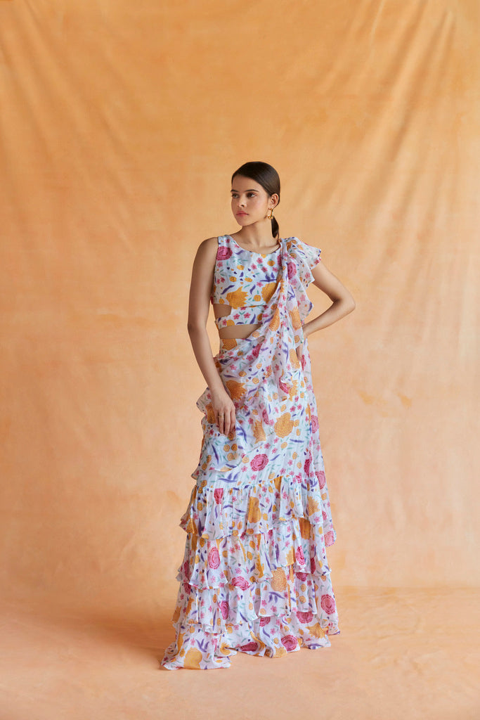 White chintz printed ruffle saree with cut out blouse