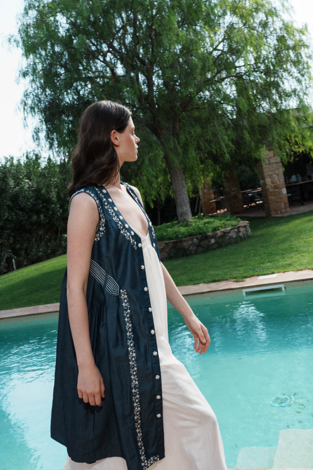 Denim front open dress with embroidery with White mul dress with lace bodice and schfflie hemline