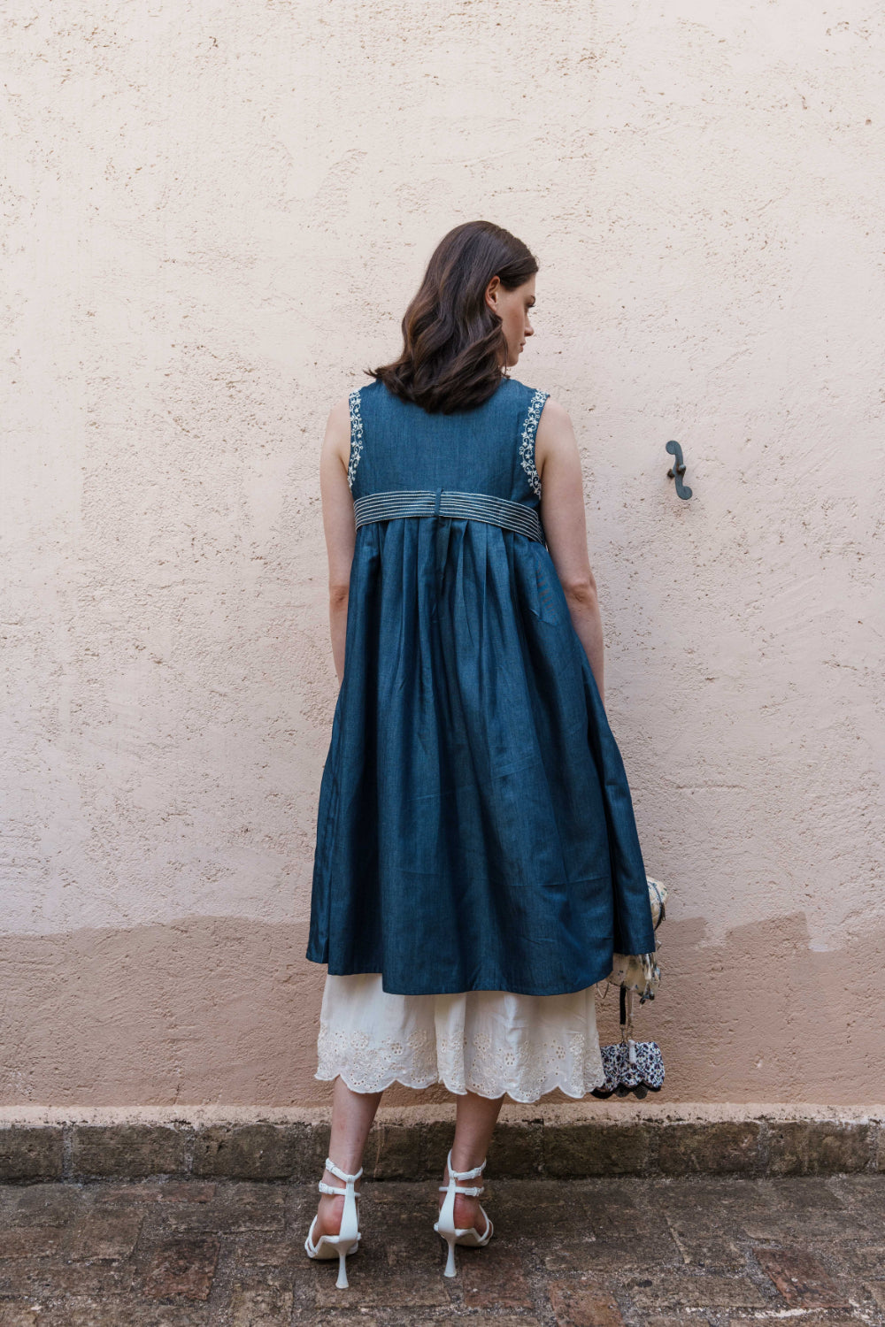 Denim front open dress with embroidery with White mul dress with lace bodice and schfflie hemline