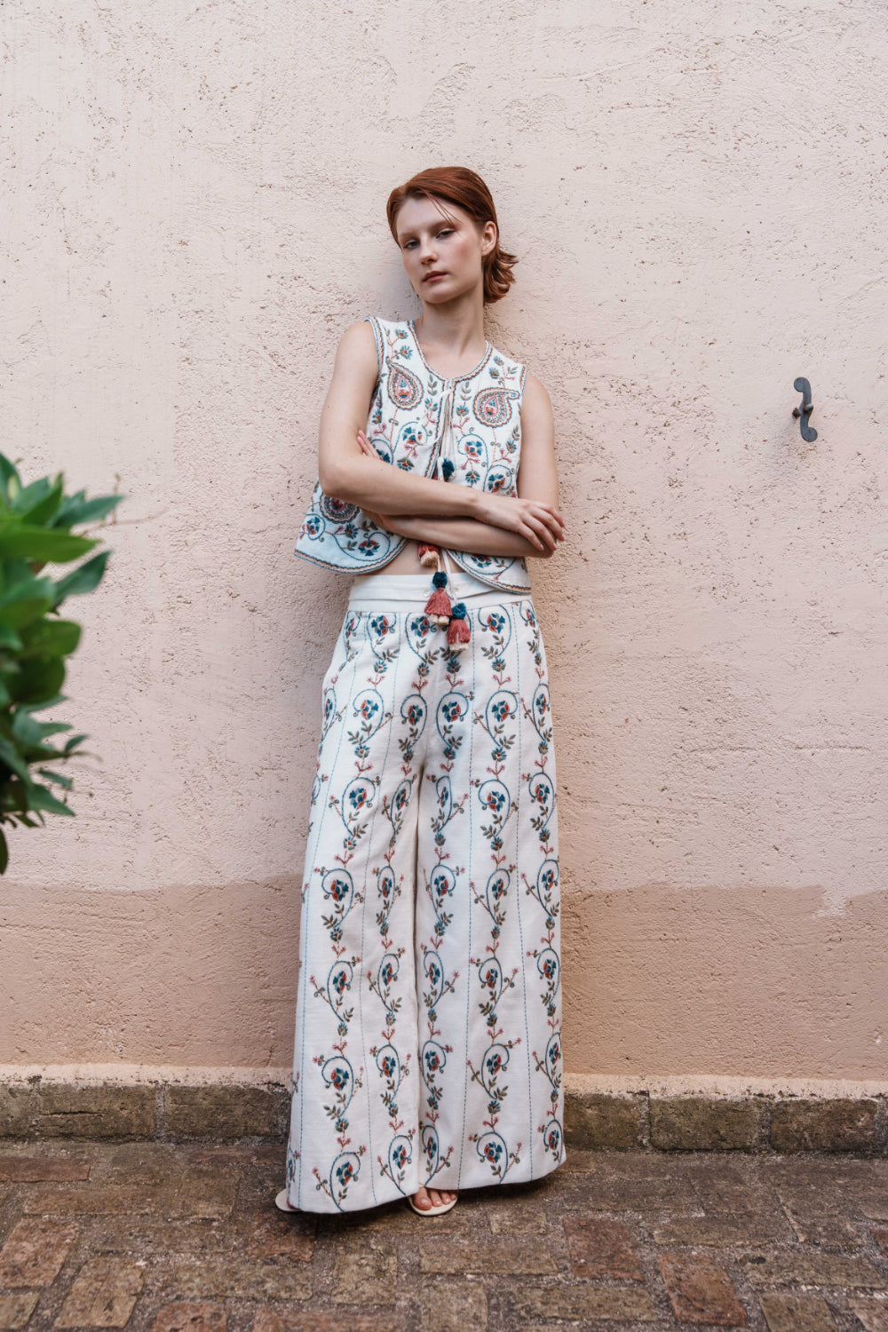 White textured fabric paisley embroidered waistcoat and embroidered pants