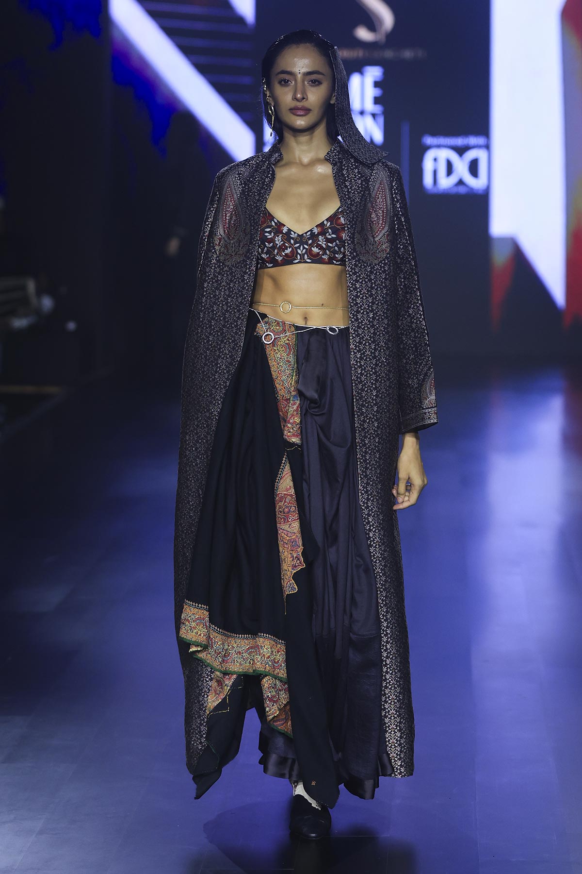 Black sari with paisley embroidered tieup blouse