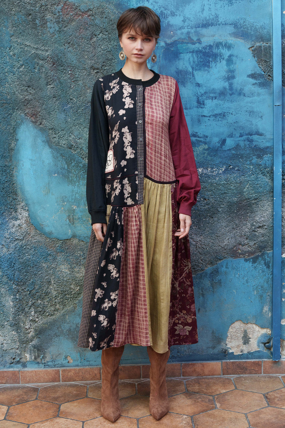 Multi color printed panelled dress with embroidery.