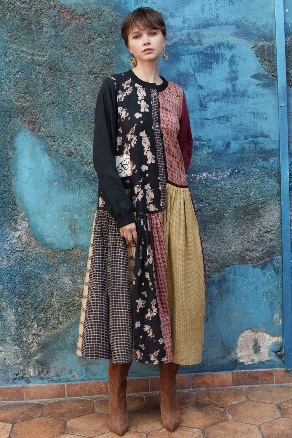 Multi color printed panelled dress with embroidery.