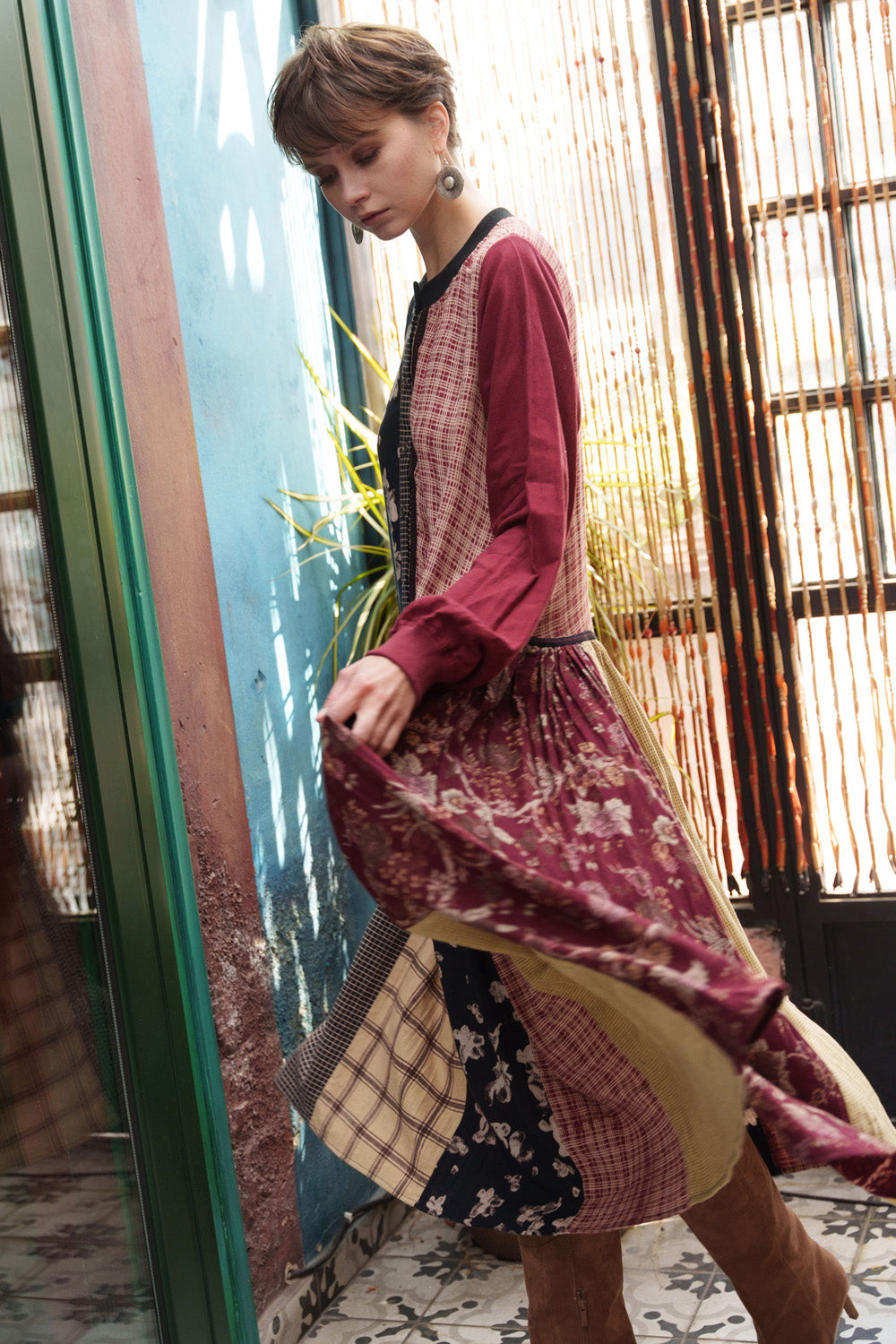 Multi color printed panelled dress with embroidery.