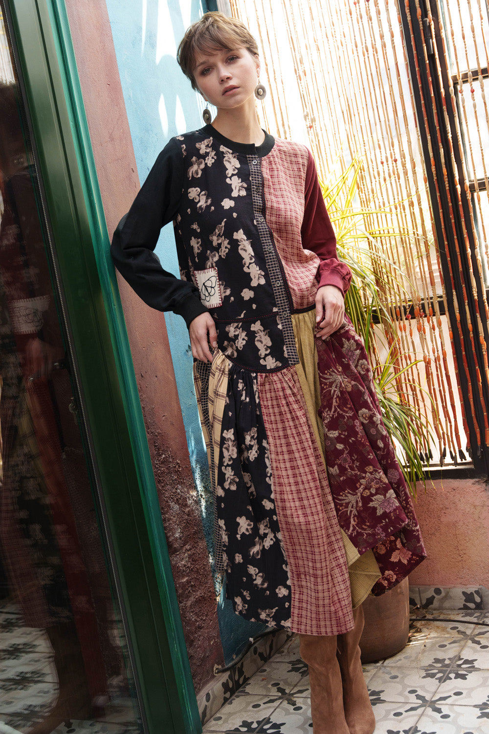 Multi color printed panelled dress with embroidery.