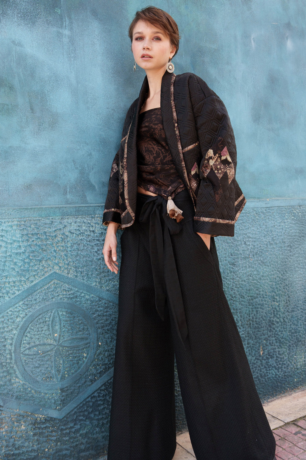 Black embroidered pleated pants