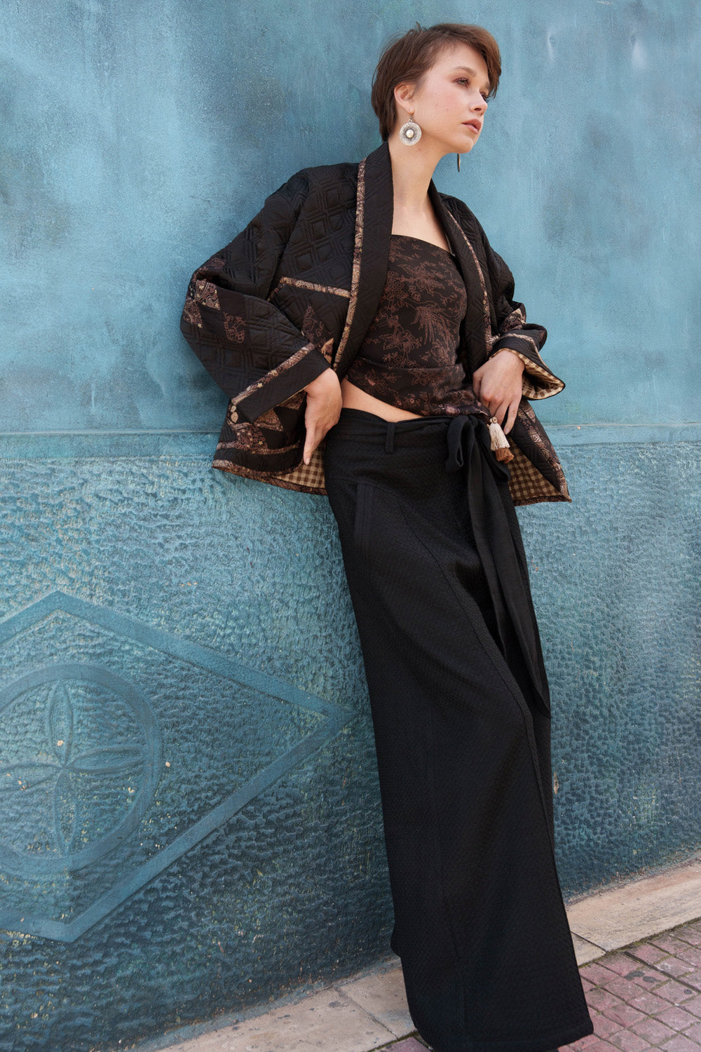 Black embroidered pleated pants