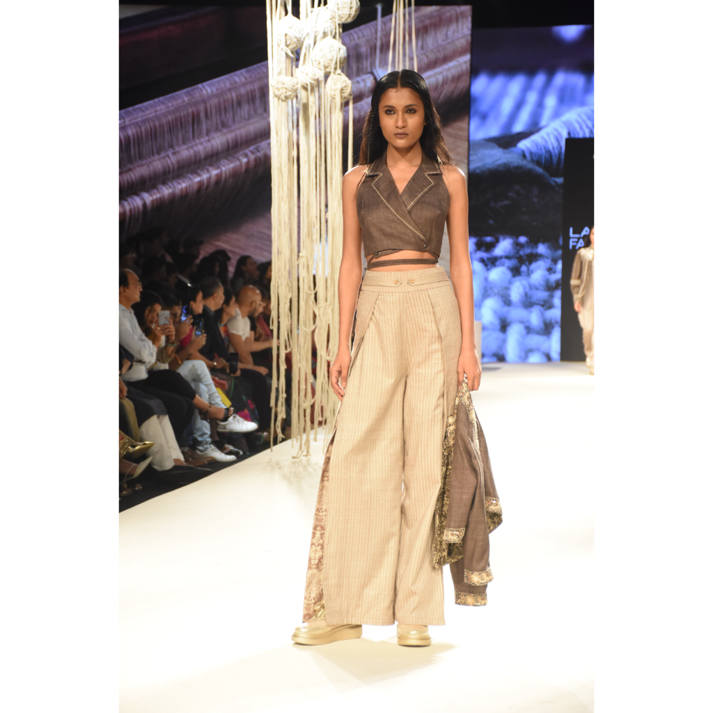 Brown khadi tie up crop top with beige stripe slit and pleated pants and brown embroidered crop jacket