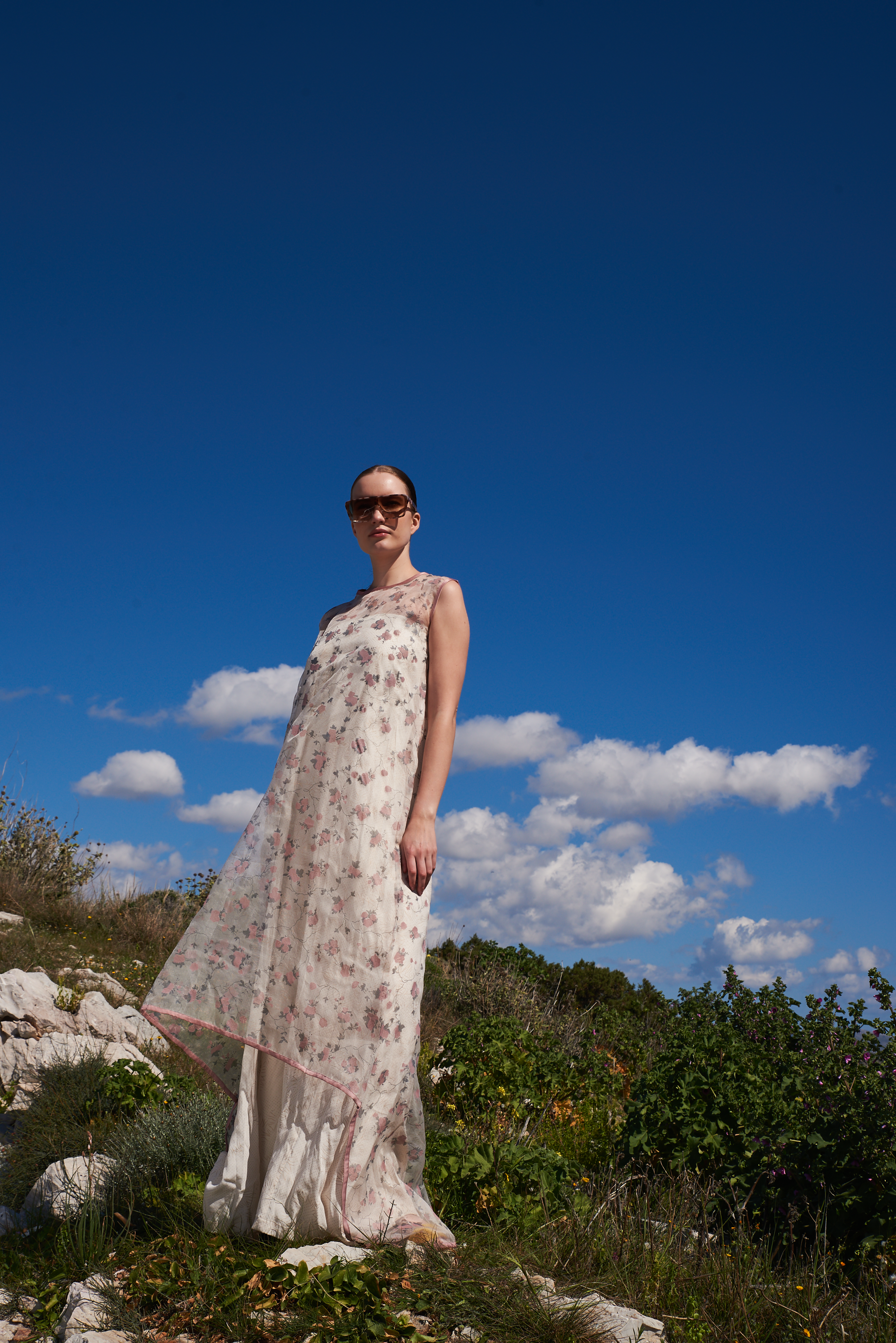 Off white printed crepe off shoulder jumpsuit with cracker printed organza sleeveless cape