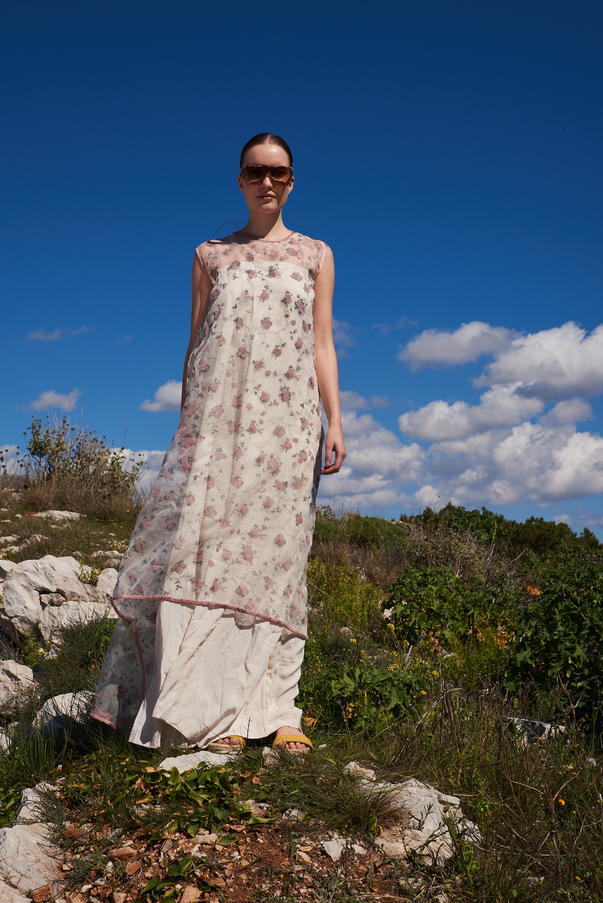 Off white printed crepe off shoulder jumpsuit with cracker printed organza sleeveless cape