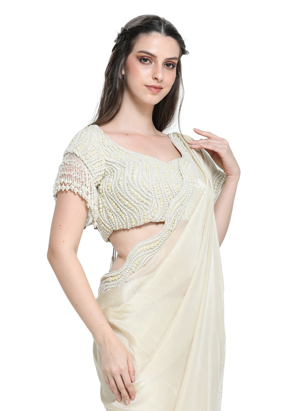 Off white tissue organza sari with pearl work border and embroidered blouse