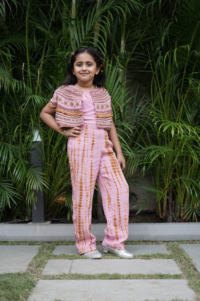 Pink and brown shibori jumpsuit with embroidered cape