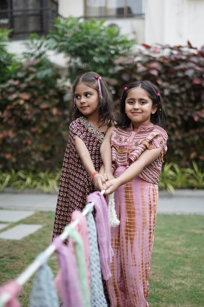 Pink and brown shibori jumpsuit with embroidered cape