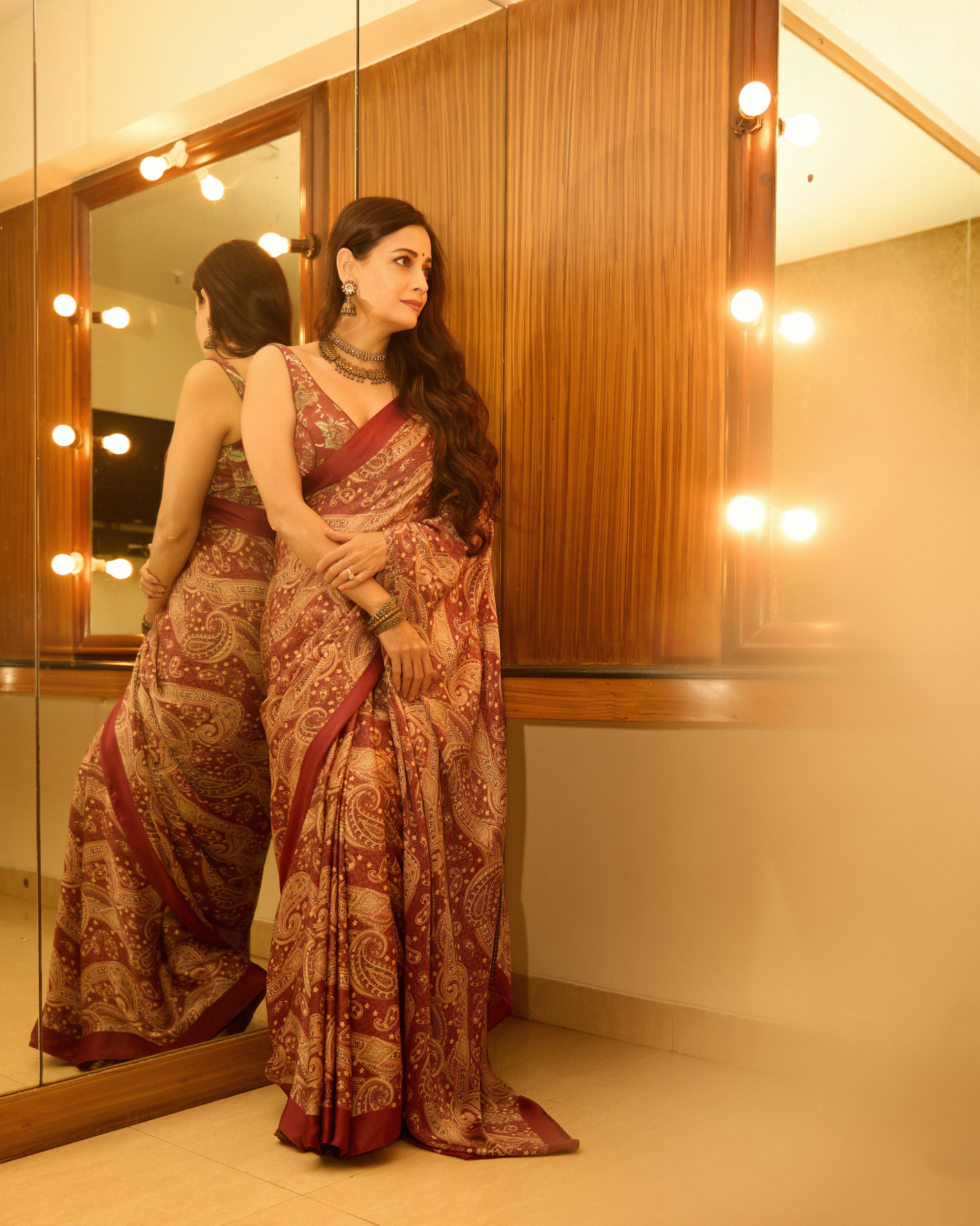 Dia Mirza in our Maroon Satin Paisley Printed Saree & Maroon Chintz Blouse