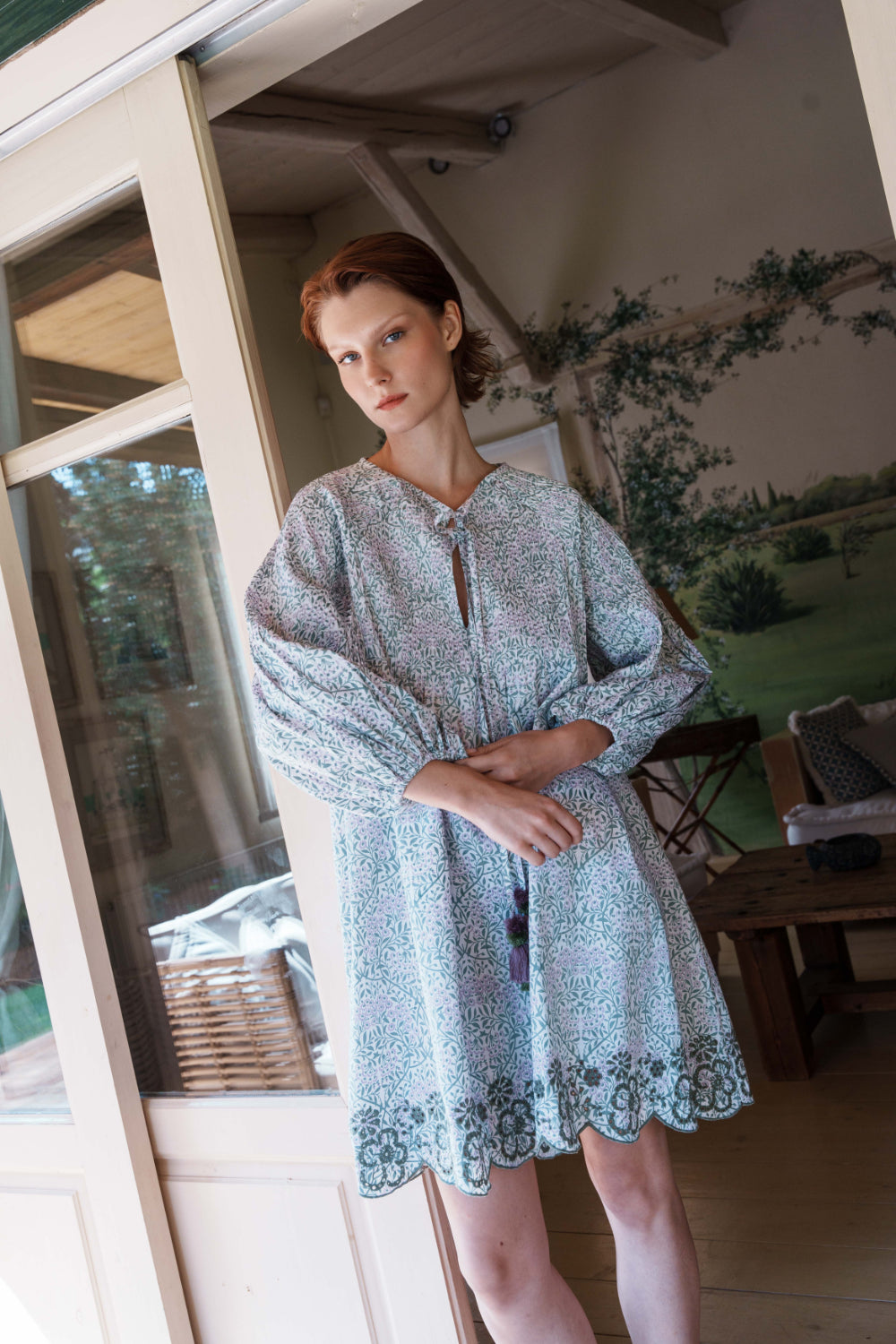 Green and lilac printed poplin dress with schfflie hemline