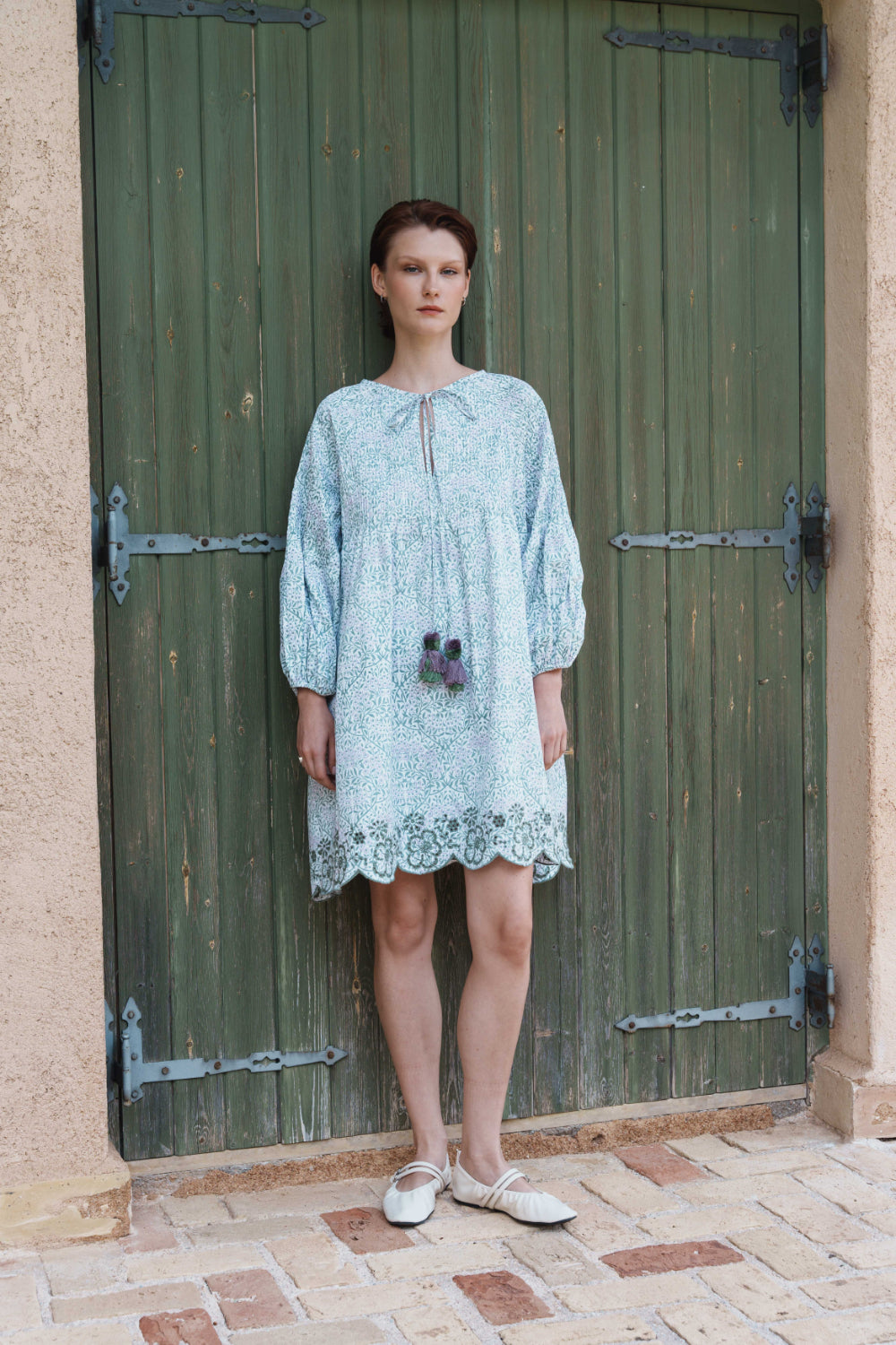 Green and lilac printed poplin dress with schfflie hemline