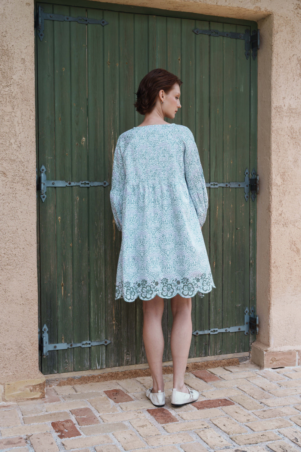 Green and lilac printed poplin dress with schfflie hemline