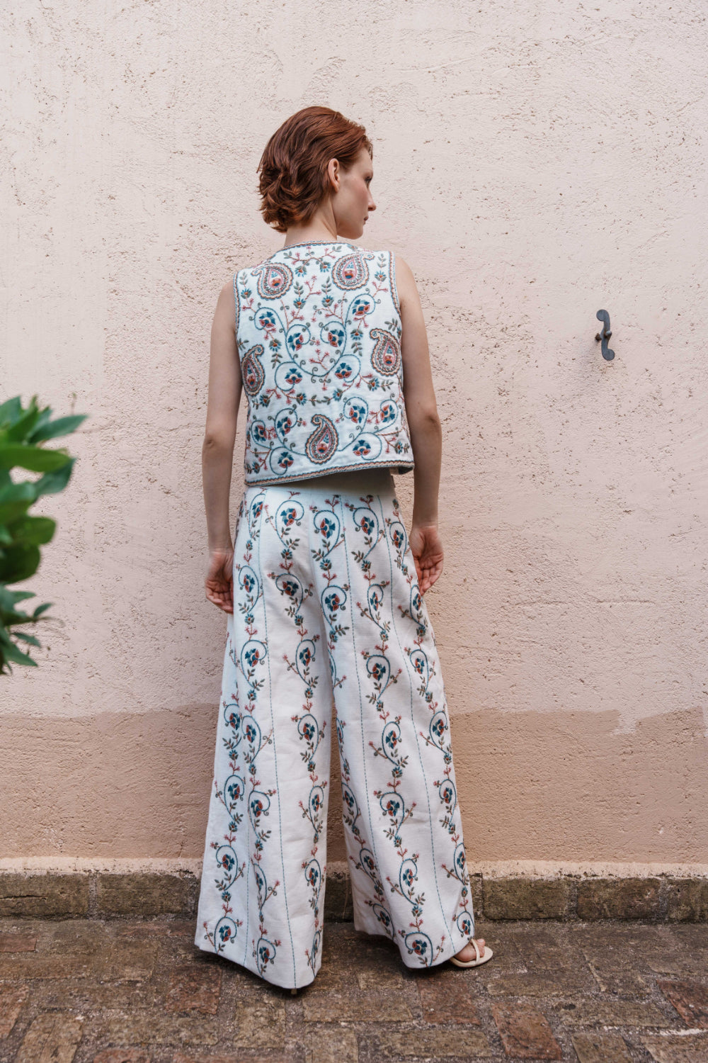 White textured fabric paisley embroidered waistcoat and embroidered pants