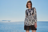 Black and white floral/ leaf printed short cutout dress with schifflie work