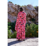 Bright floral printed throw and flared pants paired with pink bustier