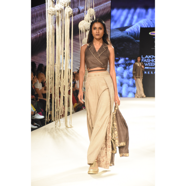 Brown khadi tie up crop top with beige stripe slit and pleated pants and brown embroidered crop jacket