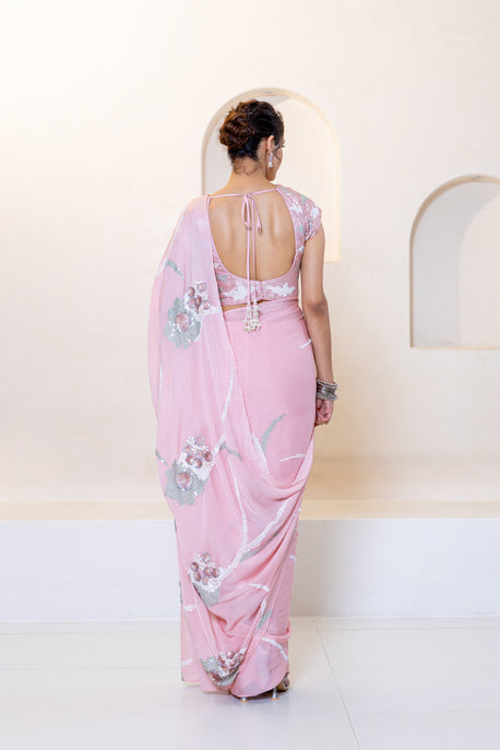 Pink chiffon sequence saree with embroidered blouse