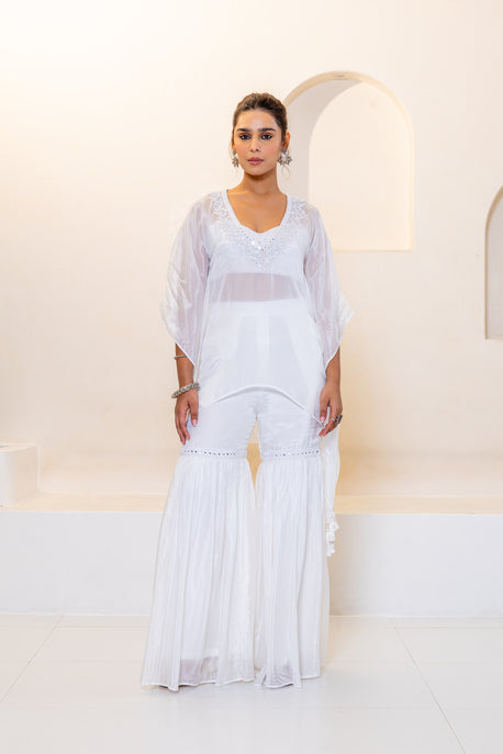 White embroidered kaftan with bustier and white sharara