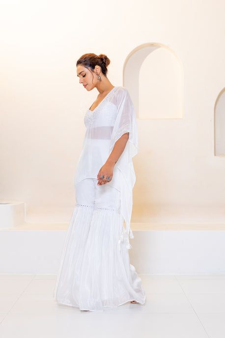 White embroidered kaftan with bustier and white sharara