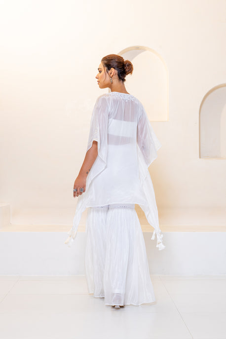 White embroidered kaftan with bustier and white sharara