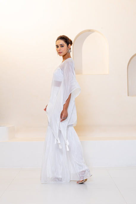 White embroidered kaftan with bustier and white sharara