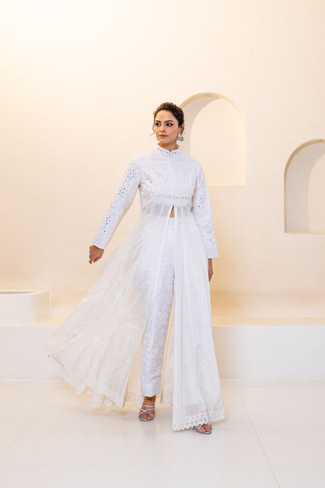 White embroidered choga with embroidered bodice and pants