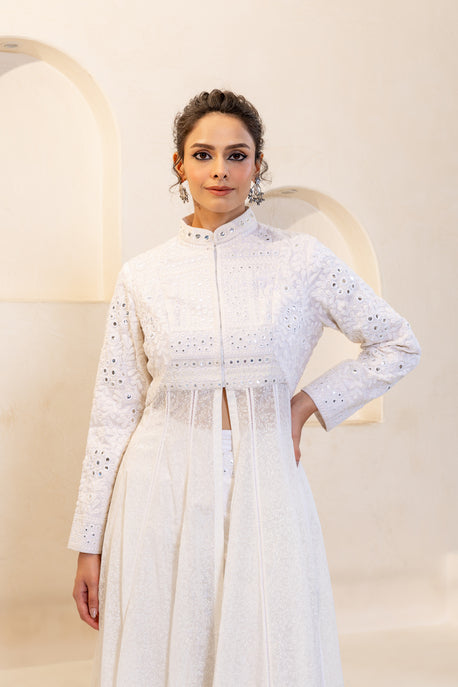 White embroidered choga with embroidered bodice and pants