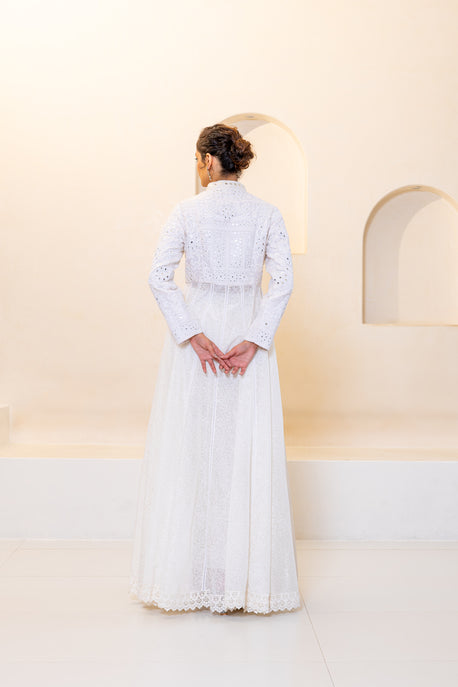 White embroidered choga with embroidered bodice and pants