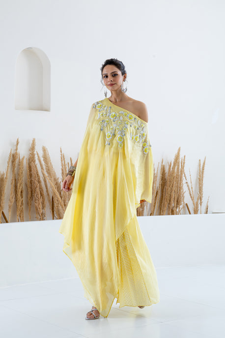 Yellow habotai silk cape with pleated skirt