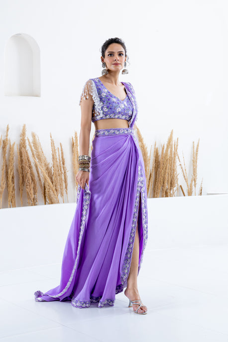 Lilac pearl crepe draped saree with embroidered border, blouse and waist belt