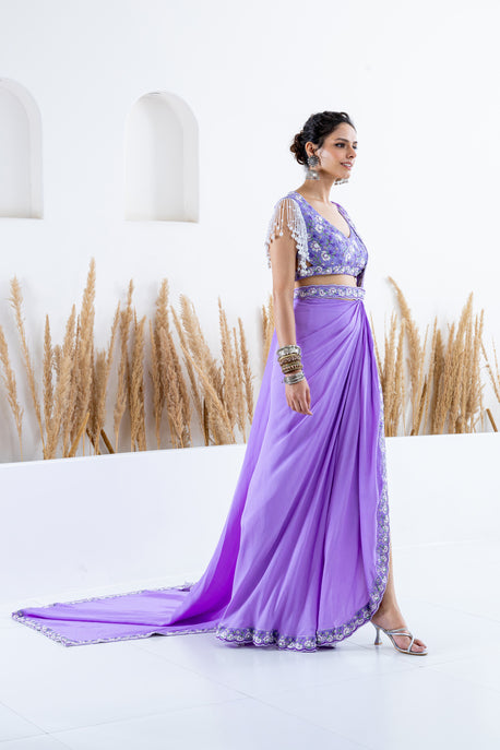 Lilac pearl crepe draped saree with embroidered border, blouse and waist belt