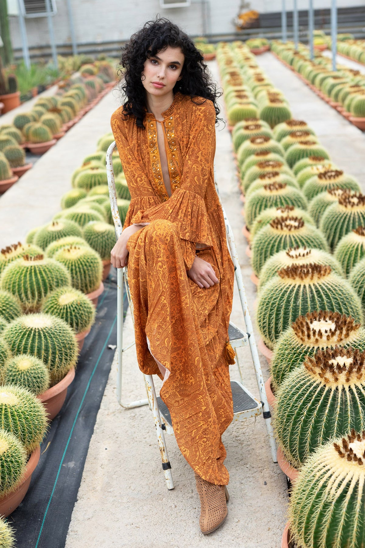 Raveena Tandon In Ochre Paisley Double Tired Dress with Embroidered Placket