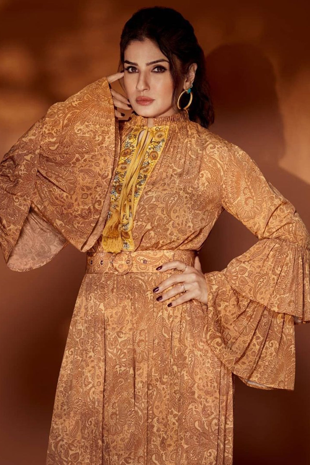 Raveena Tandon In Ochre Paisley Double Tired Dress with Embroidered Placket