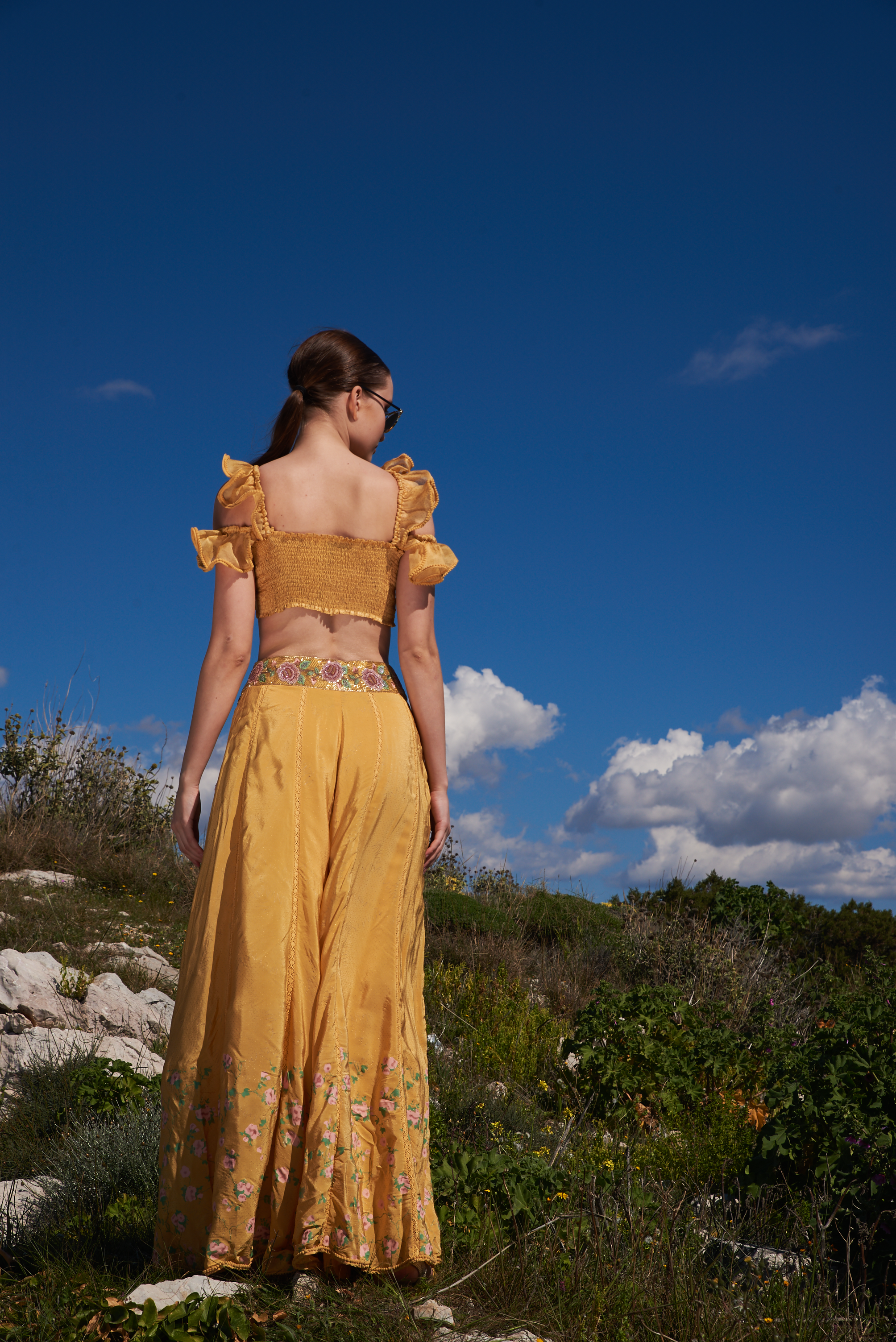 Yellow crepe printed and embroidered skirt with ruffle top