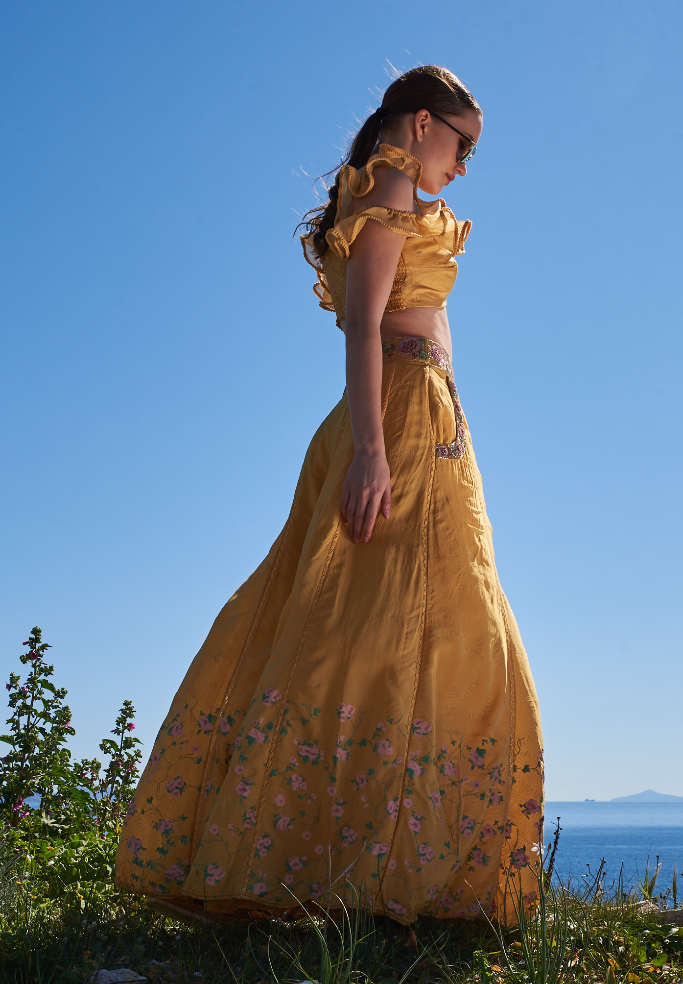 Yellow crepe printed and embroidered skirt with ruffle top