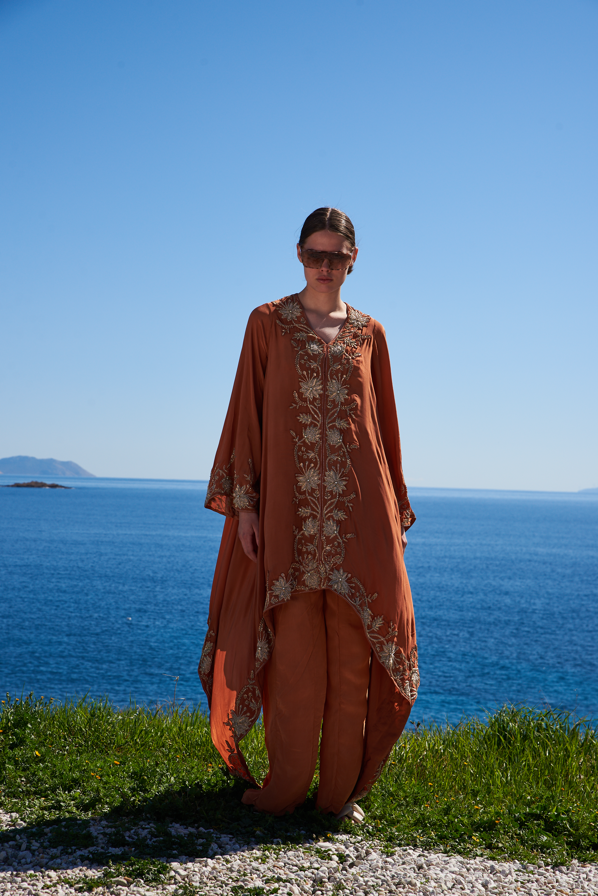 Rust crepe embroidered asymmetrical cape with rust crepe pants