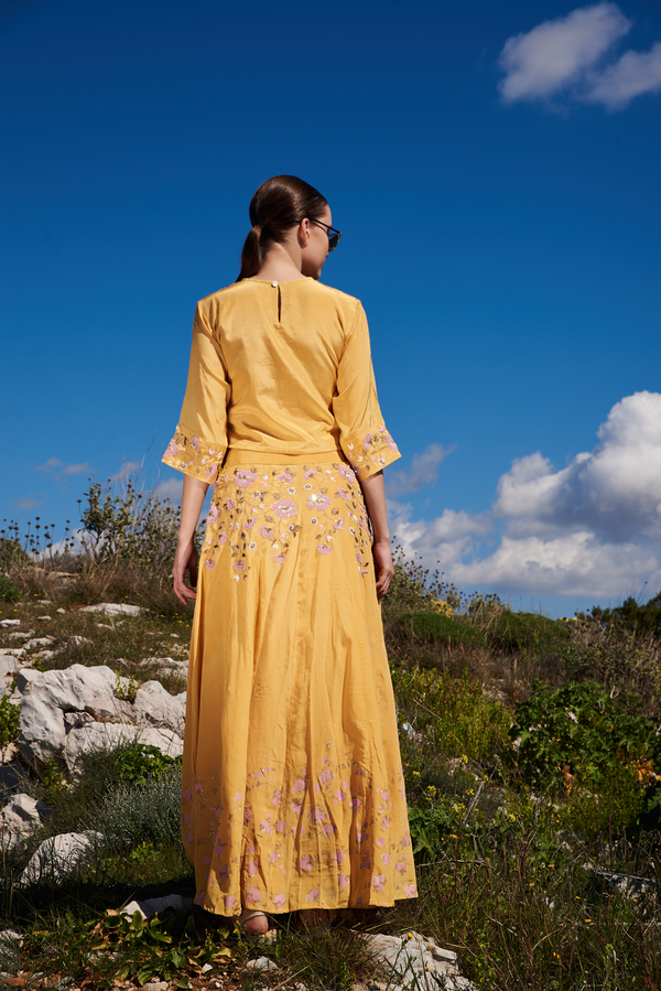 Yellow crepe printed and embroidered skirt with placement embroidered top